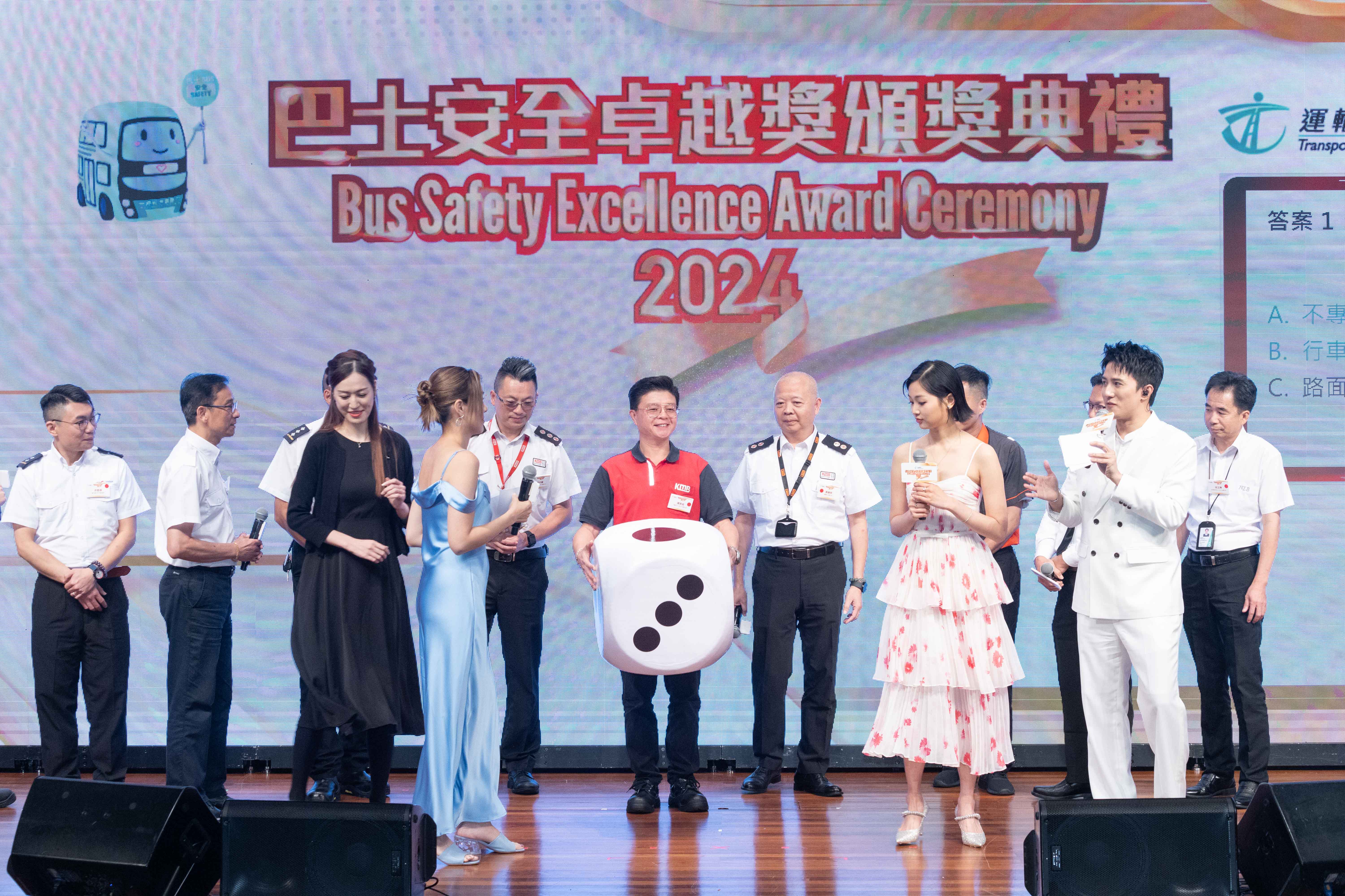 Special guest engaging in interactive game with the winners