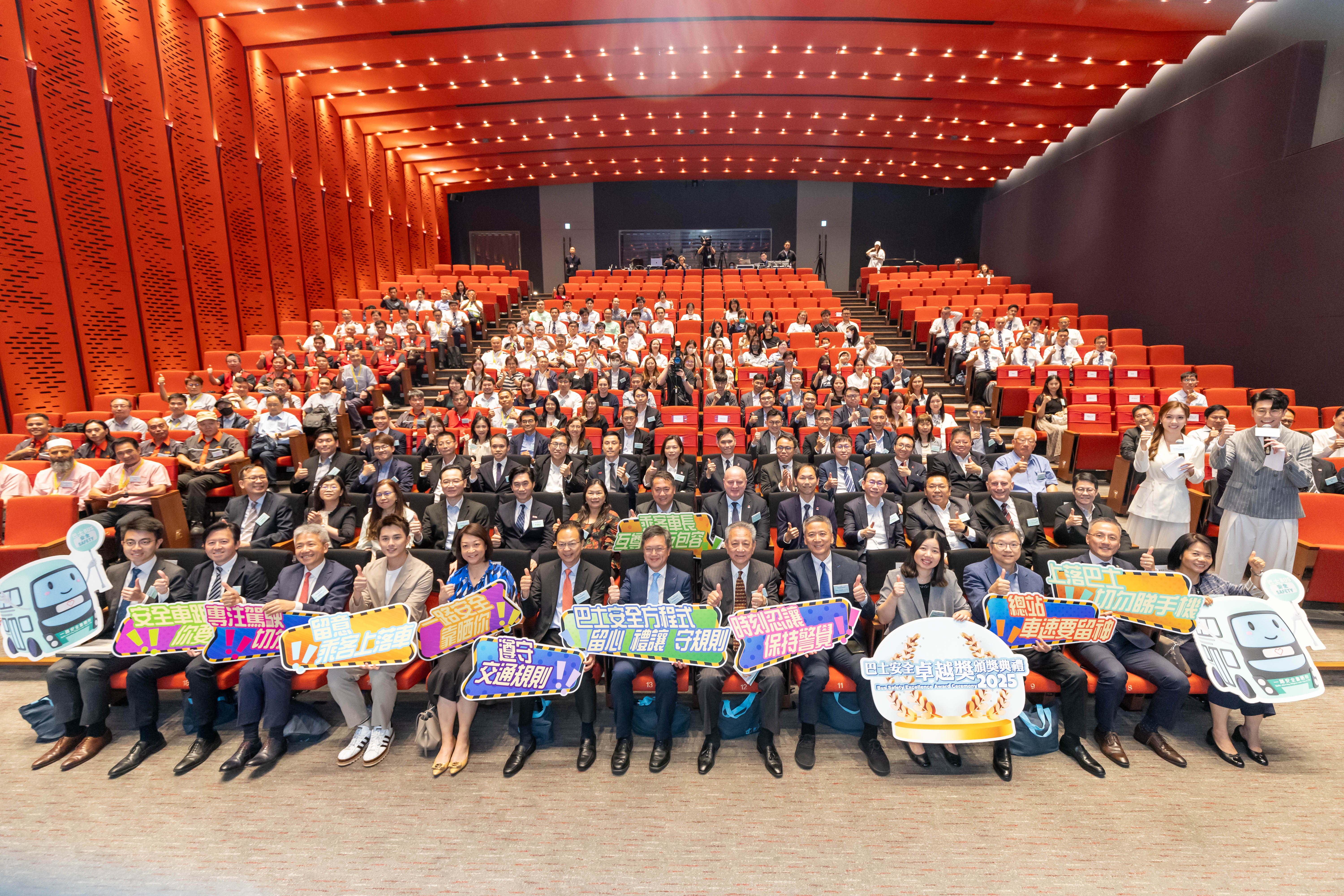 Photo of the officiating guests with representatives from the TD and franchised bus companies, awardees and guests